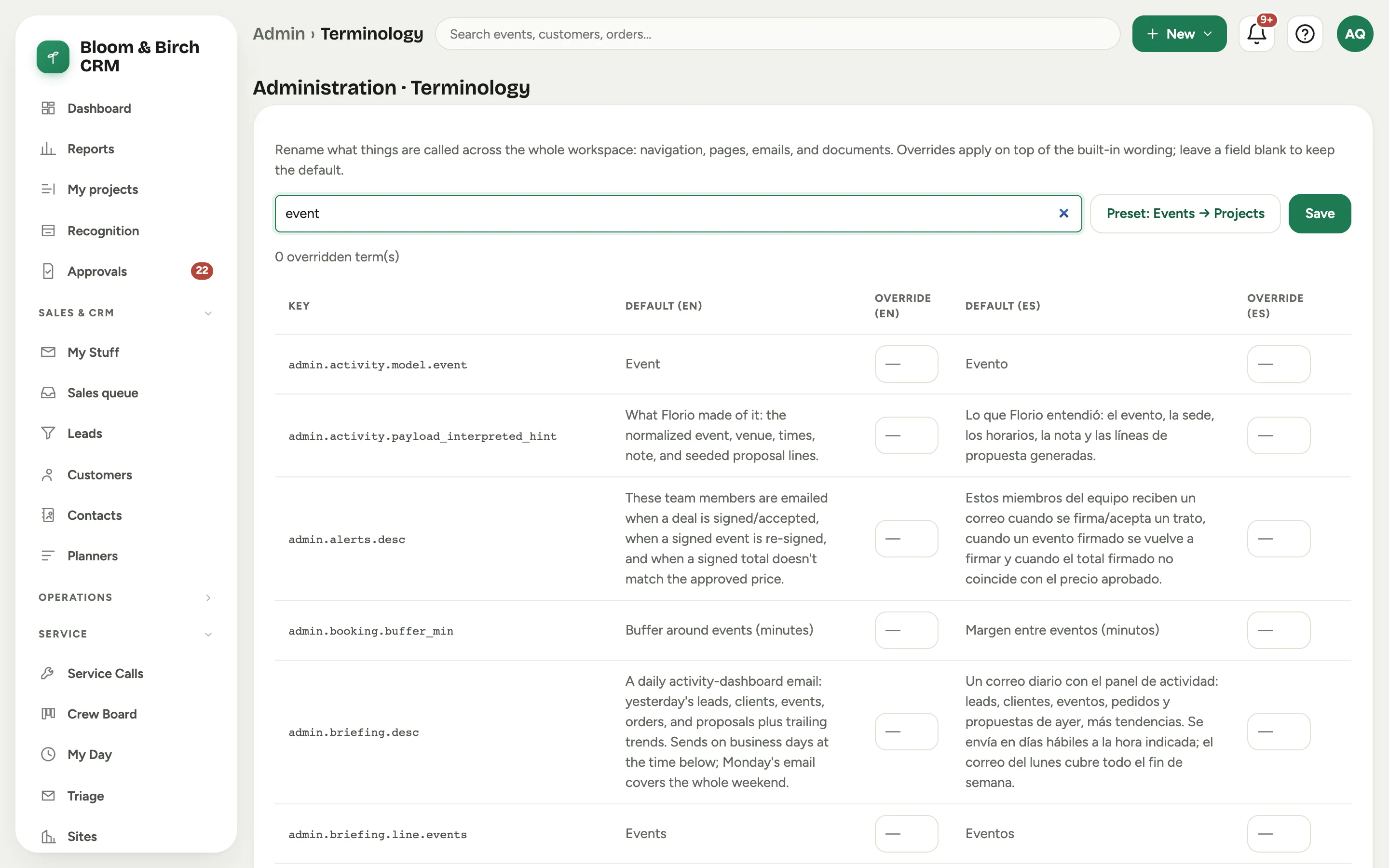 The Terminology editor: a search showing terms with their default and override columns in English and Spanish