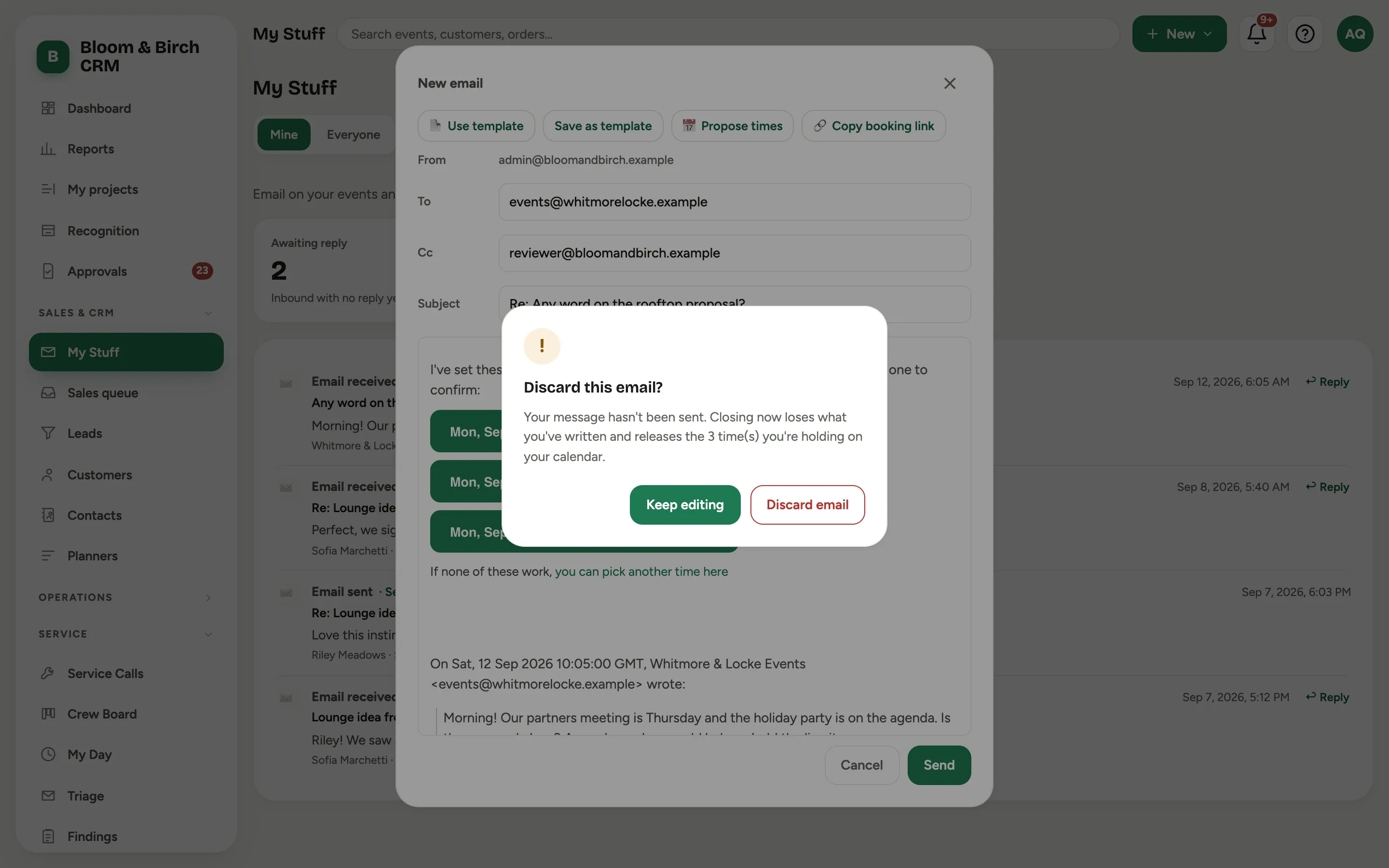 The Discard this email question over the composer, saying the message has not been sent and that closing releases the times being held on the calendar, with Keep editing and Discard email