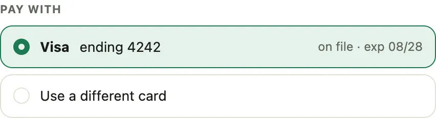 Pay with: the card on file, and Use a different card